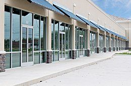 Storefront with glass door and windows